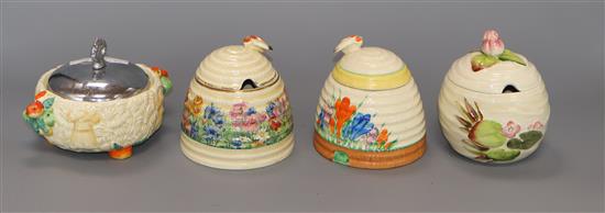 Four Clarice Cliff preserve jars